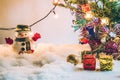 Snowman and light bulb stand among pile of snow at silent night, light up the hopefulness and happiness in Merry christmas and hap Royalty Free Stock Photo