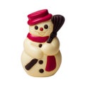 snowman made of white, dark and red chocolate in a hat and scarf with a broom. Isolated on white Royalty Free Stock Photo