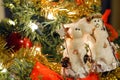 Snowman ornaments and bows in Christmas tree Royalty Free Stock Photo