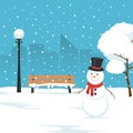 Snowman, park bench and trees covered by snow. Winter landscape in city park. Christmas background. Royalty Free Stock Photo