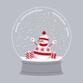 Snowman in red winter clothes with gifts in a glass snow globe. Christmas souvenir