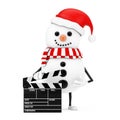 Snowman in Santa Claus Hat Character Mascot with Novie Clapper Board. 3d Rendering Royalty Free Stock Photo