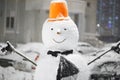 Snowman in snowfall Royalty Free Stock Photo