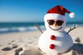 snowman wearing red santa hat and sunglasses on the beach, Happy sandy snowman with sunglasses and Santa hat on a sunny Christmas Royalty Free Stock Photo