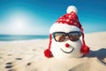 snowman wearing santa hat and sunglasses on the beach with sea background, happy sandy snowman with sunglasses and Santa hat on Royalty Free Stock Photo