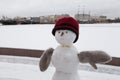 Snowman in winter clothes Royalty Free Stock Photo