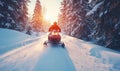 Snowmobile adventure through winter forest at sunset with snow-covered trails Royalty Free Stock Photo