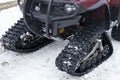 Snowmobile. Close-up of a caterpillar for driving a machine