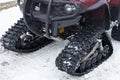 Snowmobile. Close-up of a caterpillar for driving a machine Royalty Free Stock Photo
