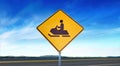 Snowmobile Crossing Symbol - Yellow Road Sign Isolated on Sky Background with Room for Copy Royalty Free Stock Photo