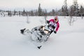 Snowmobile, girl, pink winter, polaris Royalty Free Stock Photo