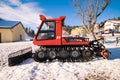 Snowmobile parked at the end of a ski slope. Royalty Free Stock Photo