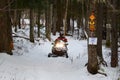Snowmobile riding on trail