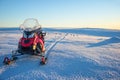 Snowmobile in a snowy landscape in Lapland near Saariselka, Finland