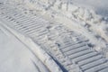 Snowmobile track print on snow in winter