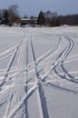Snowmobile Tracks in Snow During Winter Royalty Free Stock Photo