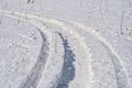 Snowmobile trail in a field