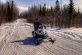 Snowmobiling through the Woods of Northern Minnesota in Winter