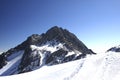 Snowmountain snow mountain under blue sky Royalty Free Stock Photo