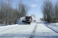 Snowplow in action Royalty Free Stock Photo