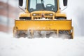 snowplow blade lifting snow, close frontal shot