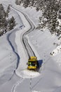 Snowplow cleaning the road