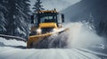 A snowplow clearing a mountain road during a heavy snowstorm, showcasing the power and efficiency of the vehicle against a Royalty Free Stock Photo