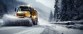 A snowplow clearing a mountain road during a heavy snowstorm, showcasing the power and efficiency of the vehicle against a Royalty Free Stock Photo