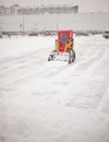 Snowplow clearing road