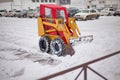 Snowplow clearing road