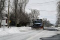 Snowplow clearing the road