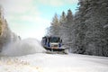 Snowplow Clears Scenic Road