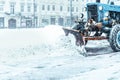 Snowplow close up cleaning street of snow Royalty Free Stock Photo