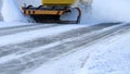 Snowplow Removes Snow Off Road