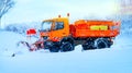 Snowplow removing the Snow from the Highway during a Snowstorm Royalty Free Stock Photo