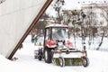 Snowplow removing snow from road in Lviv