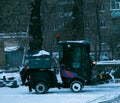 Snowplow removing snow on street after blizzard. Royalty Free Stock Photo