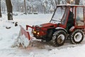 Snowplow Tractor cleaning snow Royalty Free Stock Photo