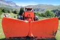 Snowplow tractor in mountain outdoor Royalty Free Stock Photo