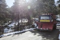 Snowplow truck crossing a bridge