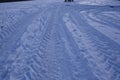 Snowscape with skid marks into the snow Royalty Free Stock Photo