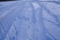 Snowscape with skid marks into the snow Royalty Free Stock Photo