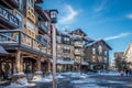 Snowshoe mountain village and restaurants and shops on a sunny d Royalty Free Stock Photo