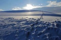 Snowshoe tracks in on a snowy mountain