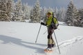 Snowshoeing in Carpathian mountains in wintertime