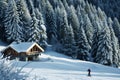 snowshoer passing by chalet nestled in pine forest Royalty Free Stock Photo