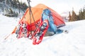 Snowshoes and a backpack near the tent.