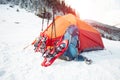 Snowshoes and a backpack near the tent.