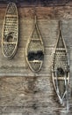 Snowshoes on a cabin wall Royalty Free Stock Photo