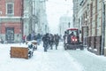 Snowstorm in city. cleaning streets of snow